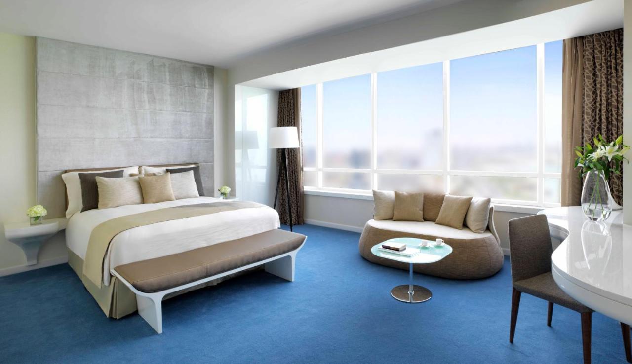 Symphony Style Hotel Kuwait Salmiya Exteriör bild A bedroom at the hotel