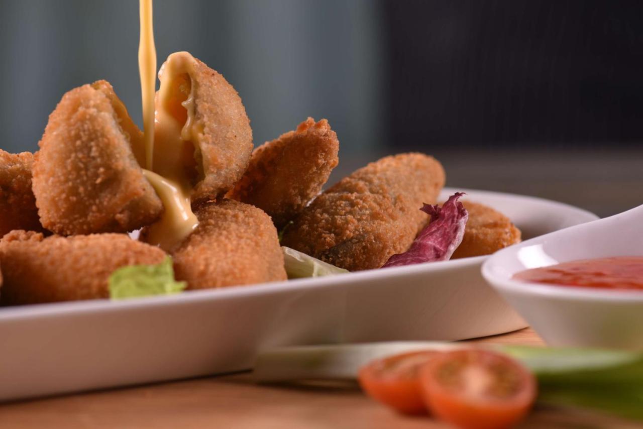 Symphony Style Hotel Kuwait Salmiya Exteriör bild Coxinha