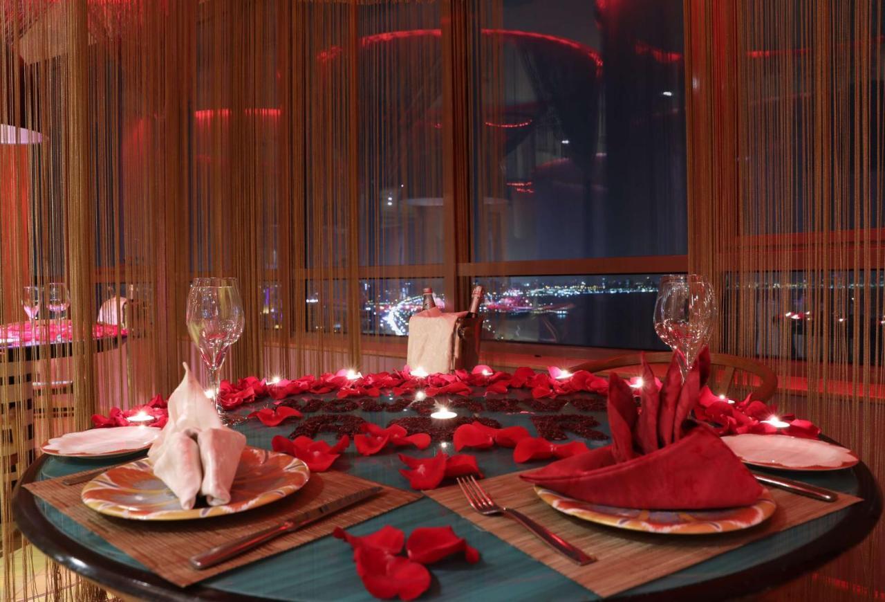 Symphony Style Hotel Kuwait Salmiya Exteriör bild A table set for a romantic dinner
